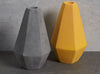 Geometric Concrete Candle Holders in grey and curry yellow by Korridor Design