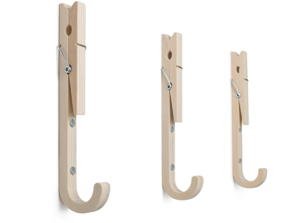 Contemporary ply wood coat hooks with upturned clothes pegs by THABTO