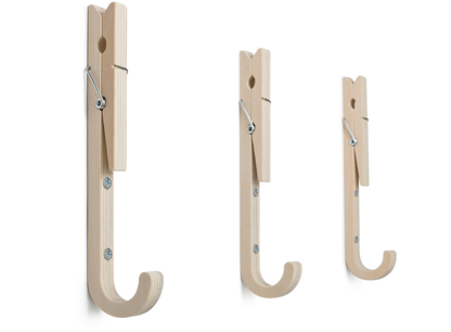 Contemporary ply wood coat hooks with upturned clothes pegs by THABTO